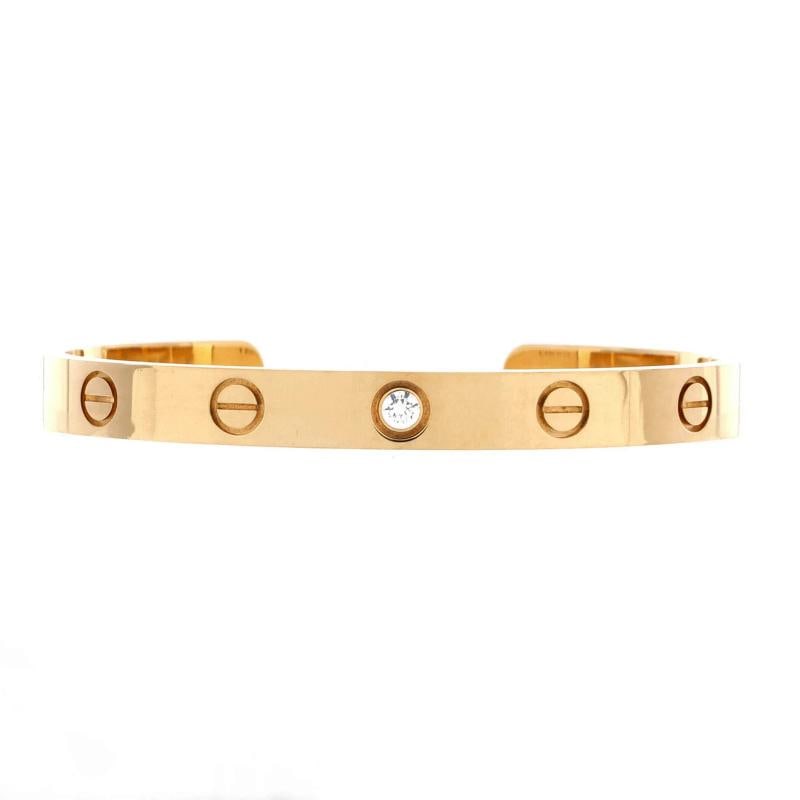 Cartier Love 1 Diamond Cuff Bracelet 18K Yellow Gold with Diamond: Condition: Pre-owned - Good,Brand: Cartier,Main Stone: Diamond,Metal: 18K Yellow Gold,Metal Purity: 18K,Style: Cuff,Type: Bracelet,Color: Yellow Gold,Material: 18K Yellow Gold, Diamond Condition: