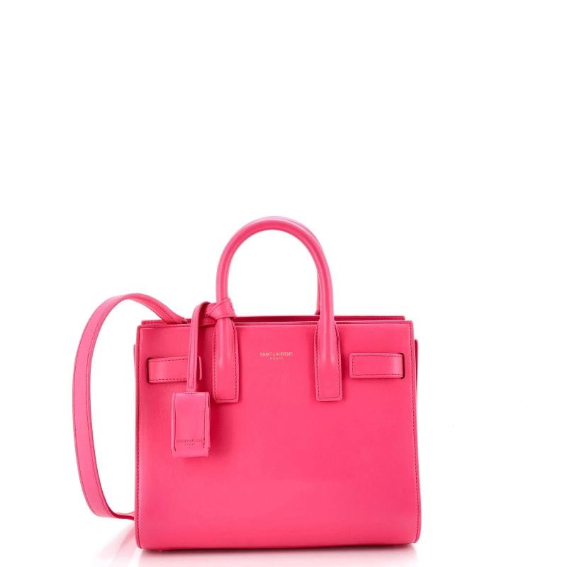 Saint Laurent Sac de Jour Bag Leather Nano: Condition: Pre-owned - Good,Brand: Saint Laurent,Exterior Material: Leather,Style: Totes,Exterior Color: Pink,Department: Women,Size: Nano,Accessories: Keys, Lock, Clochette, With Strap