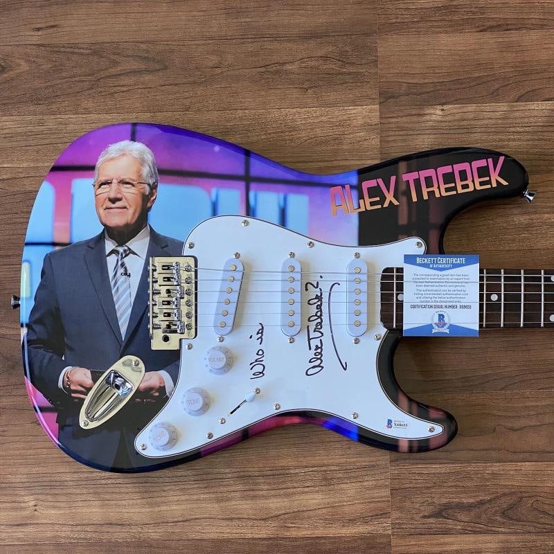 Alex Trebek Signed Guitar Custom Graphic 1/1 Beckett COA Jeopardy Inscribed!: Industry: Television,Signed by: Alex Trebek,Signed: Yes,Autograph Authentication: Beckett,Object Type: Guitar,Original/Reproduction: Original,Show: Jeopardy,Country of Origin: United States
