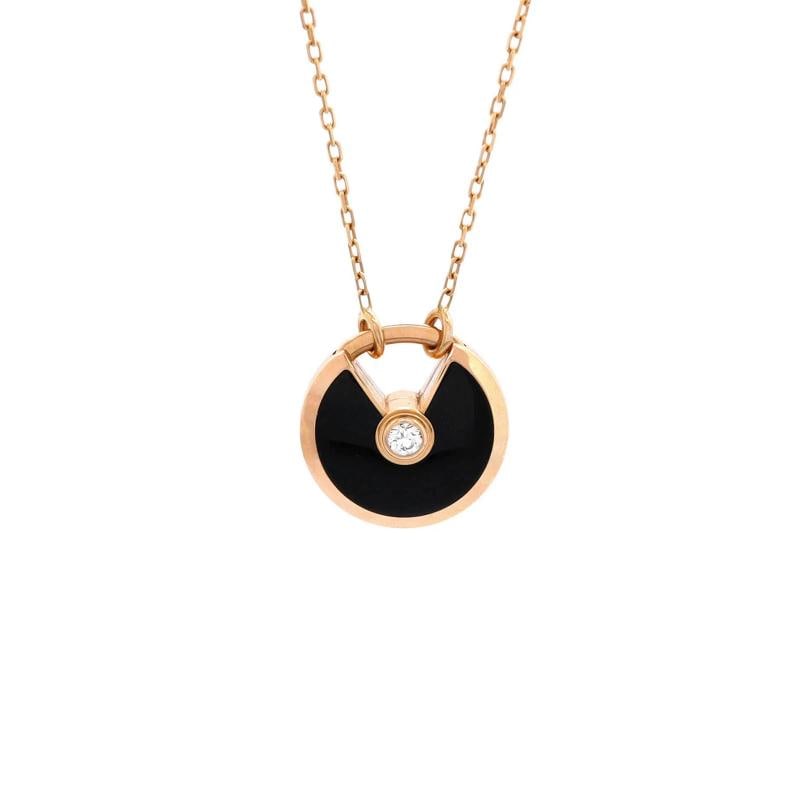 Cartier Amulette de Cartier Pendant Necklace 18K Rose Gold with Onyx and Diamond: Condition: Pre-owned - Good,Brand: Cartier,Main Stone: Unknown,Metal: 18K Rose Gold,Metal Purity: 18K,Style: Pendant,Type: Necklace,Color: Rose Gold,Material: 18K Rose Gold, Diamond, Onyx Condition: