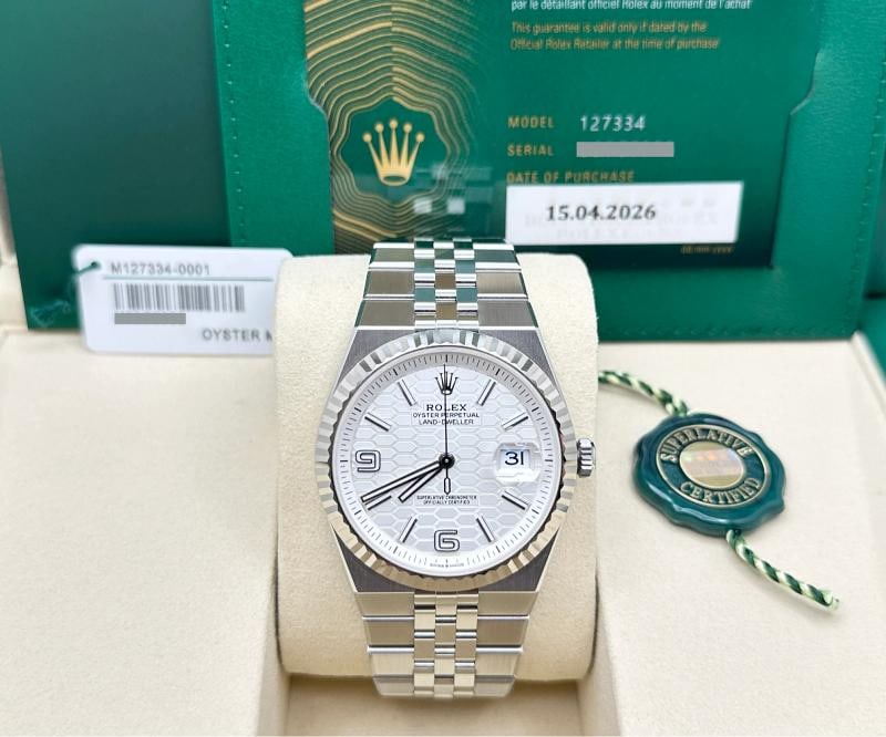 2026 NEW Rolex Land Dweller 40 127334 Honeycomb Dial 18K Gold Steel Box Paper: Style Number: 127334 Year: 2026 Model: Rolex Land Dweller 40 Case Material: Stainless Steel Band: Stainless Steel Flat Jubilee Bracelet Bezel: 18k White Gold Fluted Dial: Intense White Honeycomb