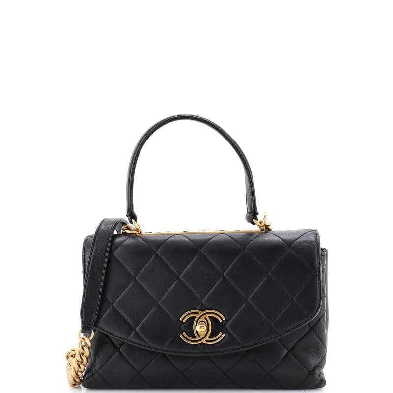 Chanel Trendy Spirit Top Handle Bag Quilted Lambskin Medium: Accessories: Authenticity Card Measurements: Handle Drop 4.5", Height 6", Width 8.5", Depth 3.5", Strap Drop 20". Condition: Pre-owned - Good,Brand: Chanel,Exterior Material: Leather,Style: Shoulder B