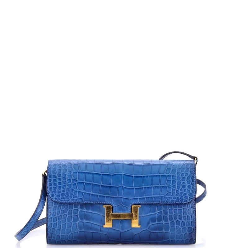 Hermes Constance To Go Wallet Alligator: Accessories: Box, With Strap Measurements: Height 5", Width 8", Depth 1" . Condition: Pre-owned - Good,Brand: Hermes,Exterior Material: Alligator, Exotic,Style: Clutches,Exterior Color: Blue,Departmen