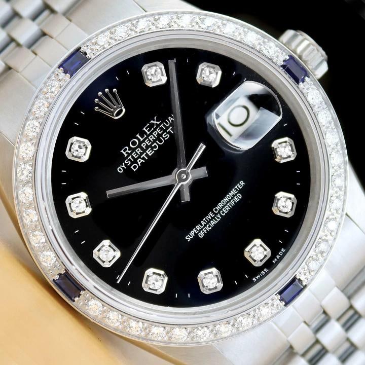 MENS ROLEX DATEJUST 16014 BLACK DIAMOND SAPPHIRE 18K WHITE GOLD STEEL WATCH: Condition: Pre-owned - Excellent,Bezel Color: Silver,Max Wrist Size: 7.26-7.5 in,Number of Jewels: 27 Jewels,Indices: Diamond Markers, 12-Hour Dial,Bezel: Custom 18K White Gold Sapphire Diamond Bezel,