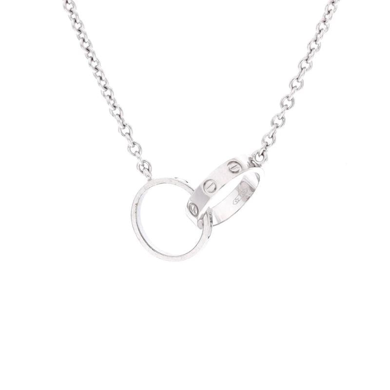 Cartier Love Interlocking Necklace 18K White Gold: Condition: Pre-owned - Good,Brand: Cartier,Main Stone: Unknown,Metal: 18K White Gold,Metal Purity: 18K,Style: Necklace,Type: Necklace,Color: White Gold,Material: 18K White Gold