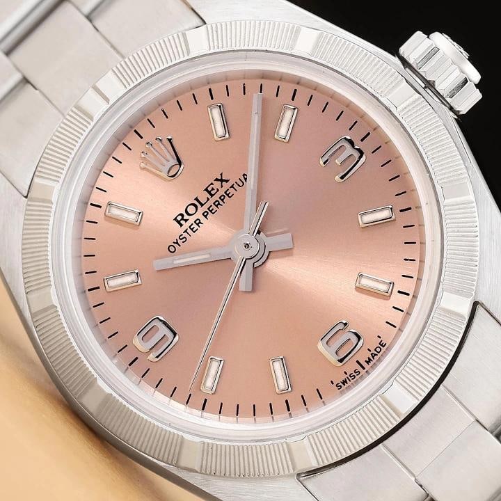 ROLEX OYSTER PERPETUAL 76030 SALMON ARABIC DIAL 24MM STEEL OYSTER WATCH: Condition: Pre-owned - Excellent,Bezel Color: Silver,Max Wrist Size: 5.5-5.75 in,Number of Jewels: 31 Jewels,Indices: Arabic Numerals, Stick Indexes,Year Manufactured: 2000-2009,Gender: Women's,Bezel: