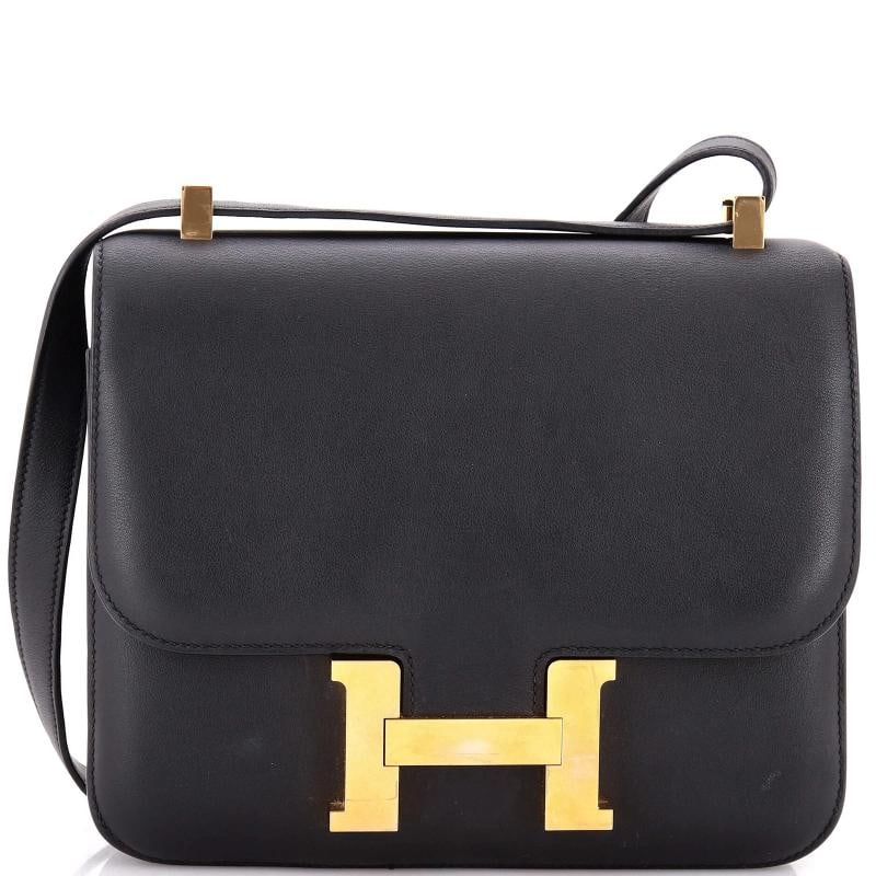Hermes Constance Bag Swift 24: Condition: Pre-owned - Good,Brand: Hermes,Exterior Material: Leather,Style: Shoulder Bags,Exterior Color: Black,Department: Women,Size: 24,Accessories: Dust Bag Condition: Good. Exterior: scuffs,