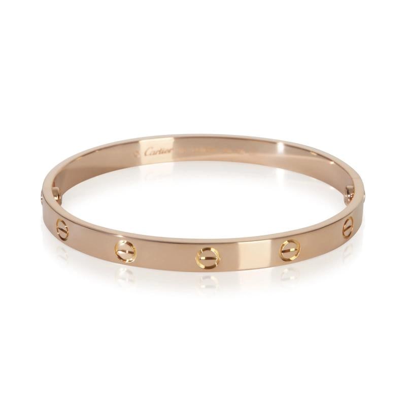 Cartier Rose Gold Love Bracelet: Condition: Pre-owned,Item Length: 18 cm,Clasp/Buckle Type: Screw,With Original Box/Packaging: Yes,With Papers: Yes,Side Stone Type: No Stone,Metal Purity: 18k,Gross Weight (grams): 33.33,Department: U