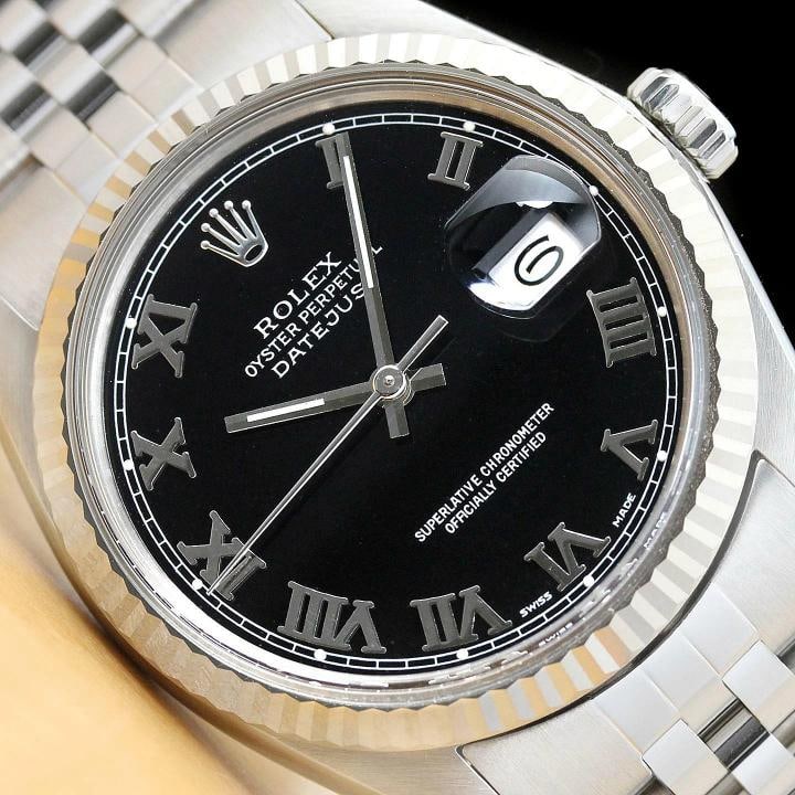 MENS ROLEX DATEJUST 16014 BLACK ROMAN 18K WHITE GOLD SS WATCH w/ JUBILEE BAND: Condition: Pre-owned - Excellent,Bezel Color: Silver,Max Wrist Size: 7.26-7.5 in,Number of Jewels: 27 Jewels,Indices: Roman Numerals, 12-Hour Dial,Bezel: Rolex 18K White Gold Fluted Bezel,Band/Strap: 