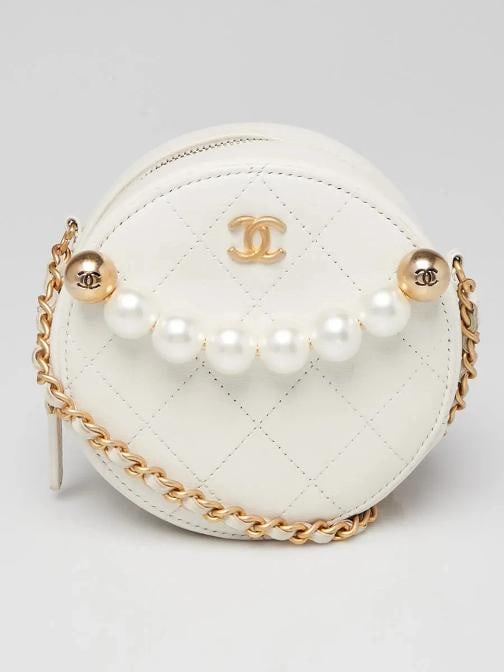 Chanel White Quilted Lambskin Leather Pearl Round Clutch with Chain Bag: Condition: Pre-owned - Good,Brand: Chanel,Exterior Material: Leather,Style: Crossbody Bags,Everyday Bags,Exterior Color: White,Department: Women,Country of Origin: Italy Description Dress up in class