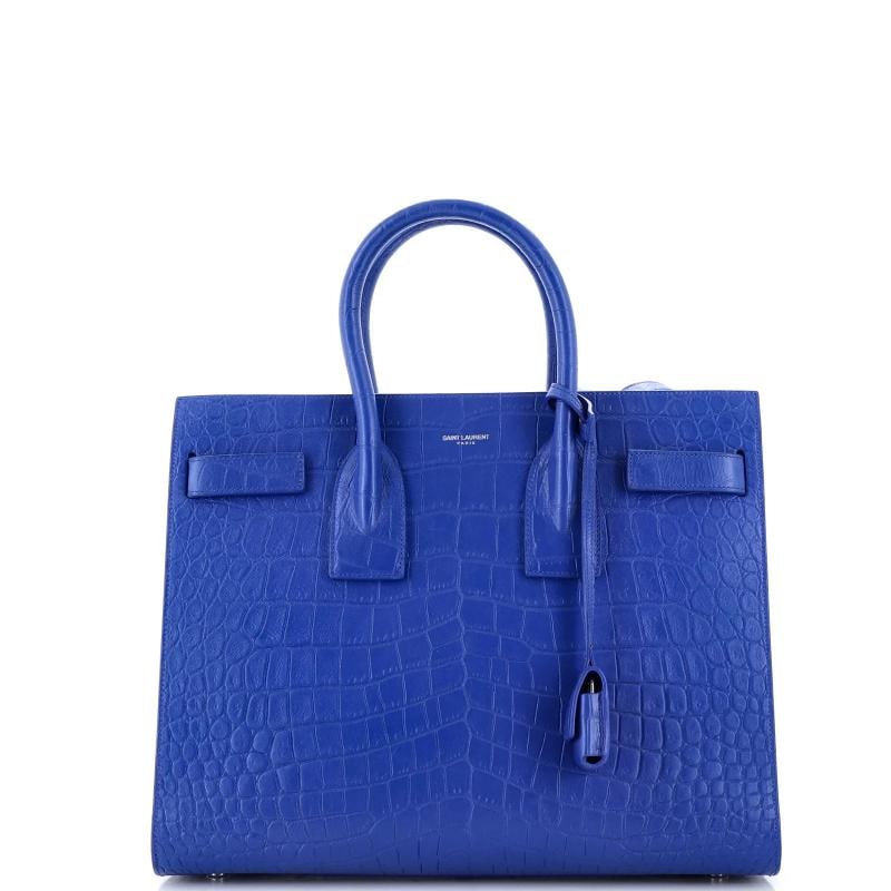 Saint Laurent Sac de Jour Bag Crocodile Embossed Leather Small: Accessories: Pochette, Keys, Clochette, Lock, With Strap Measurements: Handle Drop 4", Height 10", Width 12.5", Depth 6", Strap Drop 19". Condition: Pre-owned - Good,Brand: Saint Laurent,Exterior