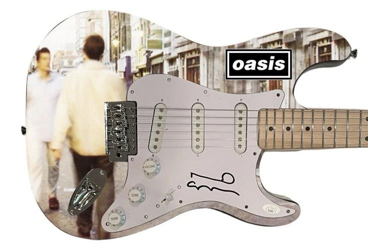 Noel Gallagher Signed Custom Guitar Oasis (JSA): Industry: Music,Signed: Yes,Autograph Authentication: James Spence (JSA),Object Type: Guitar & Guitar Pick,Original/Reproduction: Original,Country of Origin: United States
