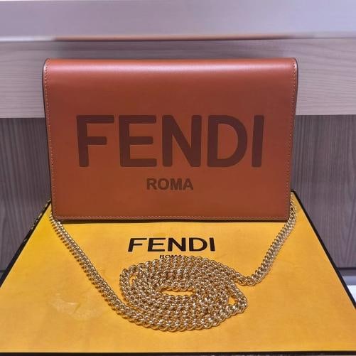 Fendi Signature Roma Logo Wallet on Chain Brown Leather Crossbody Bag: Condition: Pre-owned - Good,Brand: Fendi,Department: Women,Exterior Color: Tan,Model: Fendi Continential,Style: Crossbody,Exterior Material: Leather,Country of Origin: Italy Pre-owned Fendi Signature