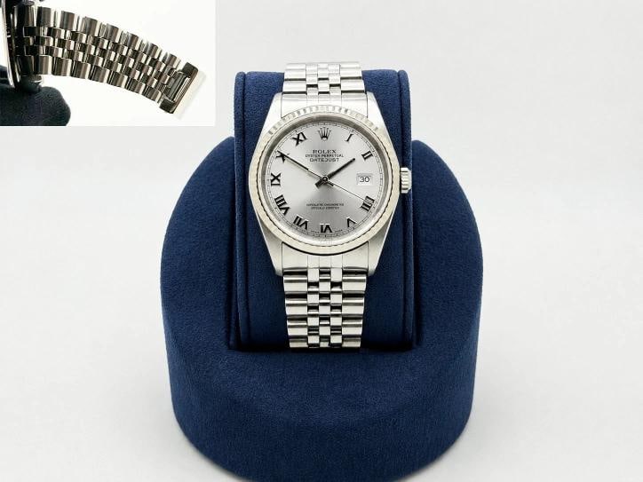 2004 Rolex Datejust 16234 36mm Silver Roman Dial 18k Gold Steel Jubilee: Style Number: 16234 Serial: F12**** Year: 2004 Model: Rolex Datejust Case Material: Stainless Steel Band: Stainless Steel Jubilee Bezel: 18k White Gold Fluted Dial: Silver Roman Dial Crystal: Sapphire