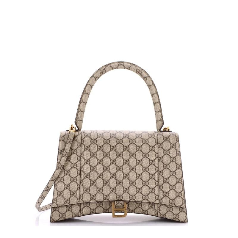 Gucci x Balenciaga The Hacker Project Hourglass Top Handle Bag GG Coated Canvas: Accessories: With Strap Measurements: Height 8", Width 12.5", Depth 4". Condition: Pre-owned - Excellent,Brand: Gucci,Exterior Material: Canvas Coated,Style: Shoulder Bags,Exterior Color: