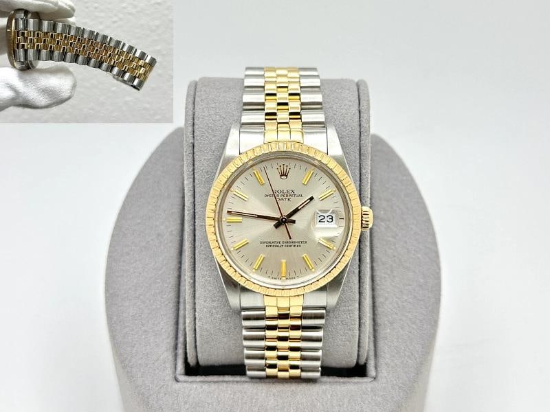 Rolex Date 15053 34mm Silver Dial 18k Yellow Gold Stainless Steel Jubilee: Style Number: 15053 Serial: R226*** Year: 1988 Model: Rolex Oyster Perpetual Date Case Material: Stainless Steel Band: 18K Yellow Gold & Stainless Steel Bezel: 18K Yellow Gold Engine Turned Bezel