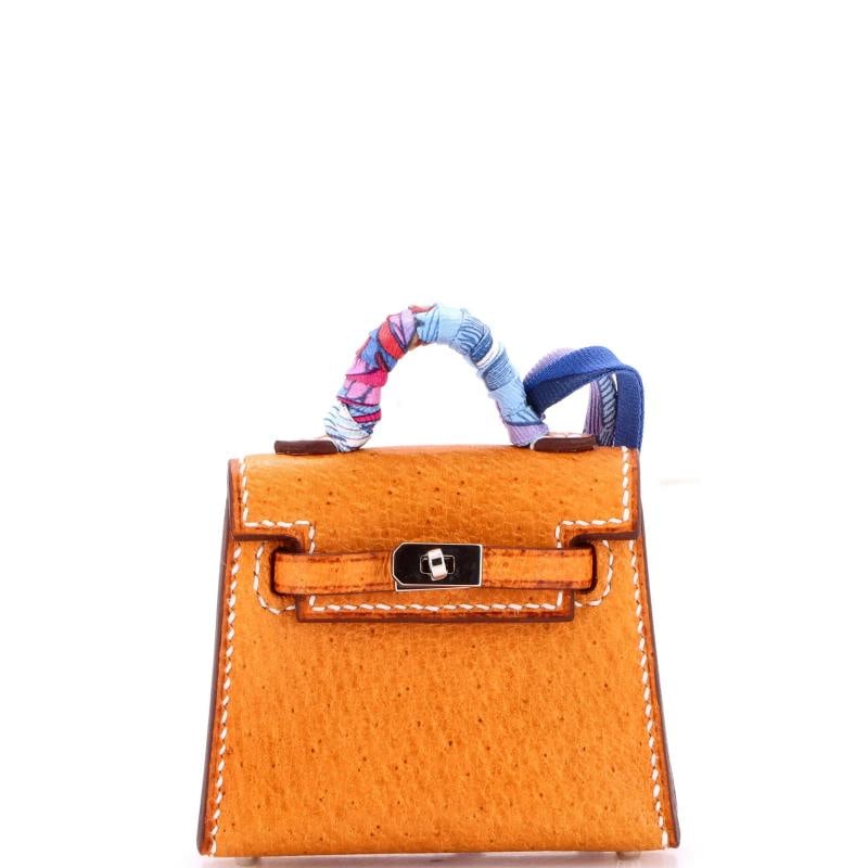 Hermes Kelly Twilly Bag Charm Peau Porc: Condition: Pre-owned - Good,Brand: Hermes,Type: Bag Accessories,Color: Brown,Department: Women,Material: Leather,Size: Unknown,Style: Peau Porc