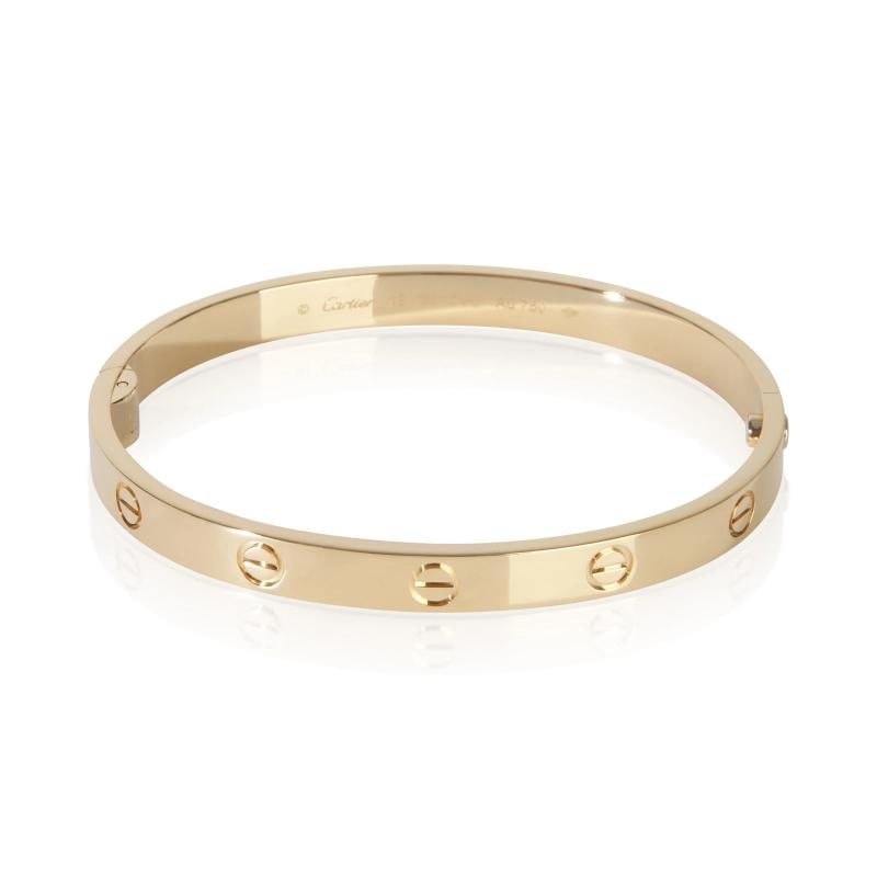 Cartier Yellow Gold Single Screw Love Bracelet: Condition: Pre-owned,Item Length: 18 cm,Clasp/Buckle Type: Screw,With Original Box/Packaging: Yes,With Papers: Yes,Side Stone Type: No Stone,Metal Purity: 18k,Gross Weight (grams): 34.20,Department: