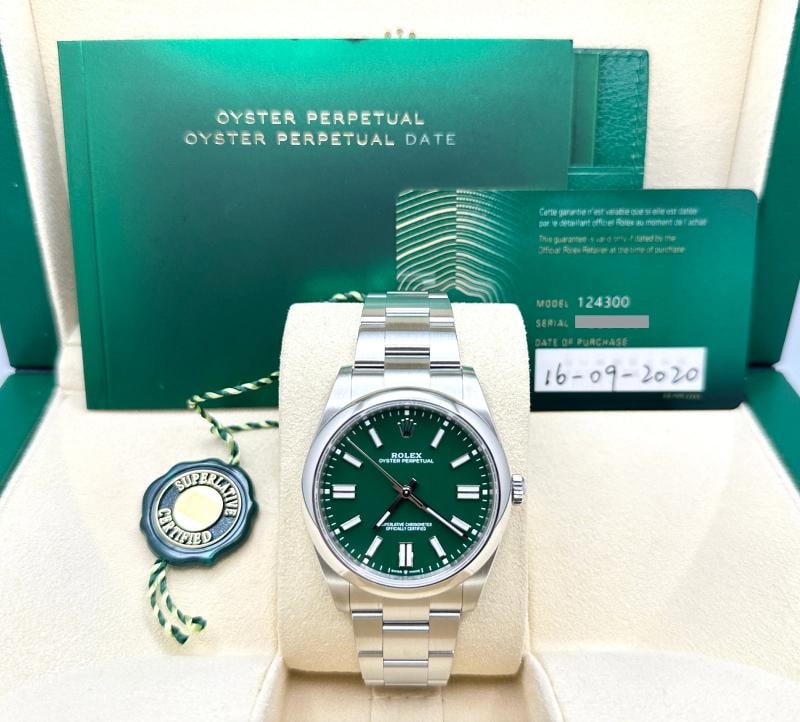 Rolex Oyster Perpetual 124300 41mm Green Dial Stainless Steel Box Papers: Style Number: 124300 Year: 2020 Model: Rolex Oyster Perpetual Case Material: Stainless Steel Band: Stainless Steel Bezel: Stainless Steel Dial: Green Crystal: Sapphire Case Size: 41mm Includes: - Role