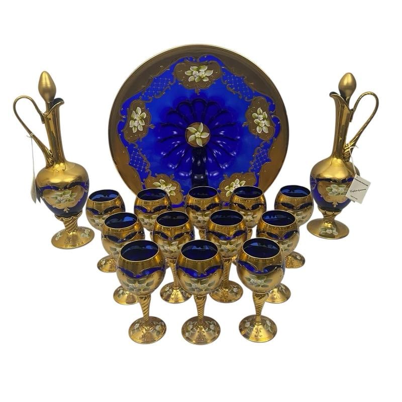 RARE~ 15pc Murano Glass Decanter Set: excellent condition with no chips or cracks. -Hand painted, artist signed, 24K gold -15 pieces including 1 x 16" Diameter bowl 1 x 16" Decanter 1 x 15" Decanter 12 x 7" Glasses. Condition: Used,Countr