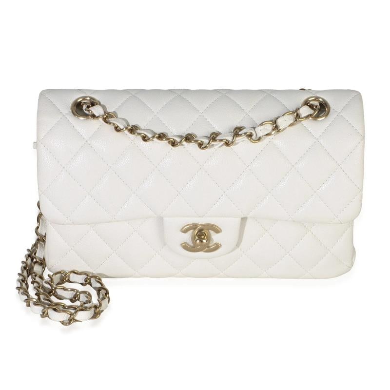 Chanel White Quilted Caviar Small Classic Double Flap Handbag: Condition: Pre-owned - Good,Dimensions: 9 x 5.5 x 2.25,Handbag Accessories: None,Bag Width: 9 in,Bag Depth: 2.25 in,Bag Height: 5.5 in,Department: Unisex,Style: Shoulder Bag,Material: Leather,Color: W