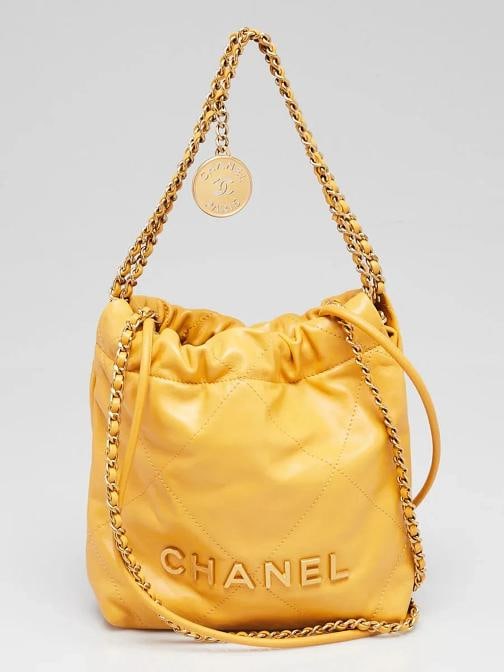 Chanel Yellow Quilted Calfskin Leather Chanel 22 Mini Bag: Condition: Pre-owned - Good,Brand: Chanel,Exterior Material: Leather,Style: Crossbody Bags,Everyday Bags,Exterior Color: Yellow,Department: Women,Country of Origin: Italy Description From Chanel's 202