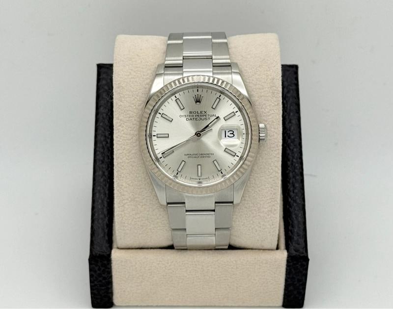 Rolex Datejust 126234 36mm Silver Dial 18K White Gold Stainless Steel: Style Number: 126234 Serial: 218FR*** Year: 2020-2025 Model: Rolex Datejust Case Material: Stainless Steel Band: Stainless Steel Bezel: 18K White Gold Fluted Bezel Dial: Silver Face: Sapphire Crystal