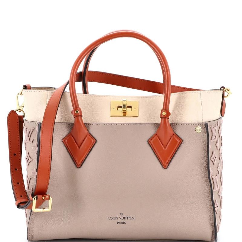 Louis Vuitton On My Side Tote Monogram Tuffetage Leather MM: Accessories: With Strap Measurements: Handle Drop 4", Height 10", Width 12", Depth 5", Strap Drop 20-22". Condition: Pre-owned - Good,Brand: Louis Vuitton,Exterior Material: Leather,Style: