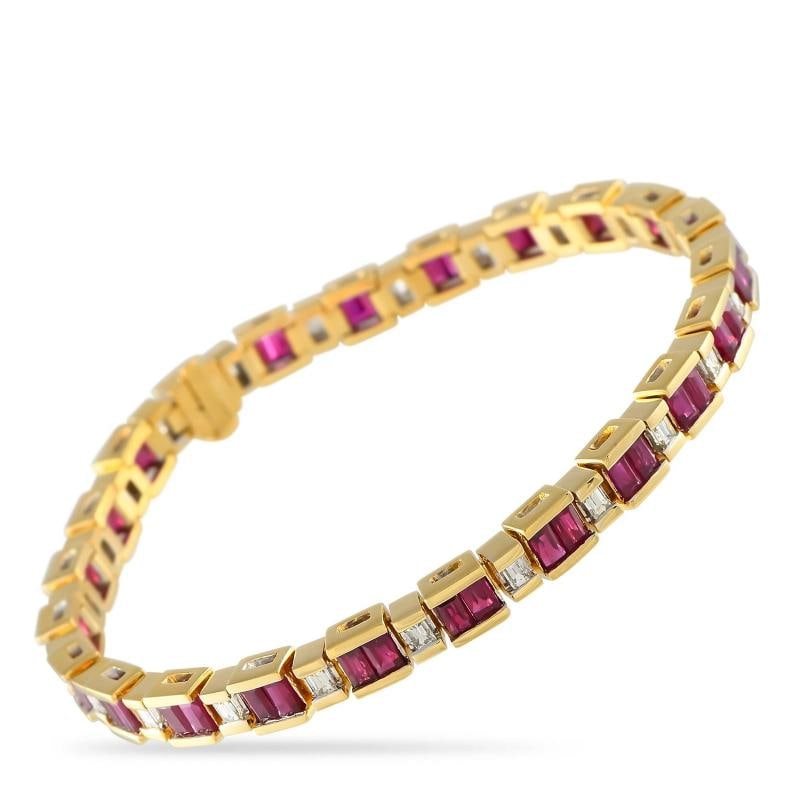 18K Yellow Gold 1.50ct Diamond and Ruby Bracelet: features duos of step-cut rubies on half bezels set between baguette diamonds that are also on half bezels. Together, they form a 7-inch-long line of sparkle and rich beauty.This LB Exclusive 18K