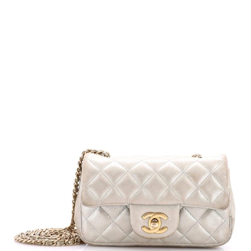 Chanel Classic Single Flap Bag Quilted Iridescent Calfskin Extra Mini: Accessories: Dust Bag Measurements: Handle Drop 13", Height 5", Width 6.5", Depth 2.5", Strap Drop 24". Condition: Pre-owned - Fair,Brand: Chanel,Exterior Material: Leather,Style: Cross Body