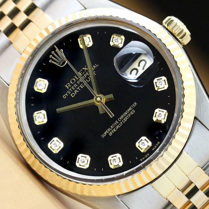 ROLEX MENS DATEJUST 16013 BLACK DIAMOND 18K YELLOW GOLD STEEL QUICKSET WATCH: This is an authentic Rolex Datejust 16013 watch with Rolex 18K yellow gold and stainless steel jubilee bracelet, Rolex dial Ref. with added genuine diamond markers, and Rolex 18K yellow gold fluted be