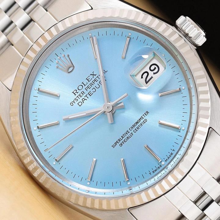 ROLEX MENS DATEJUST 16014 ICE BLUE DIAL 18K WHITE GOLD STEEL JUBILEE WATCH: This is an authentic Rolex Datejust 16014 watch with Rolex dial Ref., Rolex 18K white gold fluted bezel, and Rolex stainless steel jubilee band. Descriptions: Brand: Rolex Model: Datejust Reference: 1