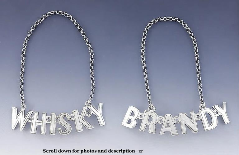 Great Pair Antique English Sterling Silver Liquor Labels Tickets Whisky Brandy: Composition: Sterling Silver,Country of Origin: United Kingdom Presented is a wonderful pair of sterling silver liquor labels or bottle tickets. One of the labels is for whisky, and the other is for