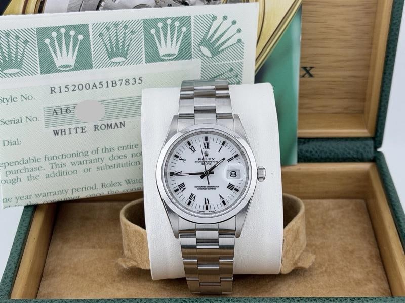 Rolex Oyster Perpetual Date 15200 34mm White Roman Dial Steel Box Papers: Style Number: 15200 Serial: A16**** Year: 1999 Model: Rolex Oyster Perpetual Date Case Material: Stainless Steel Band: Oyster Stainless Steel Bezel: Stainless Steel Dial: White Roman Crystal: