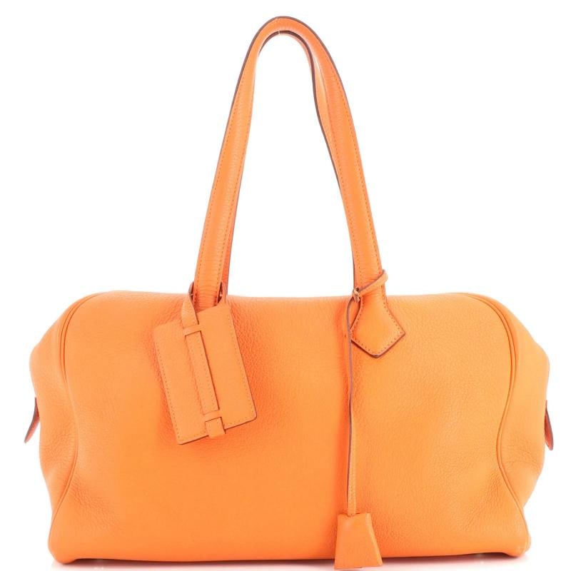 Hermes Victoria II Bag Clemence 35: Condition: Pre-owned - Good,Brand: Hermes,Exterior Material: Leather,Style: Satchels,Exterior Color: Orange,Department: Women,Size: 35,Accessories: Lock, Luggage Tag, Clochette, Keys