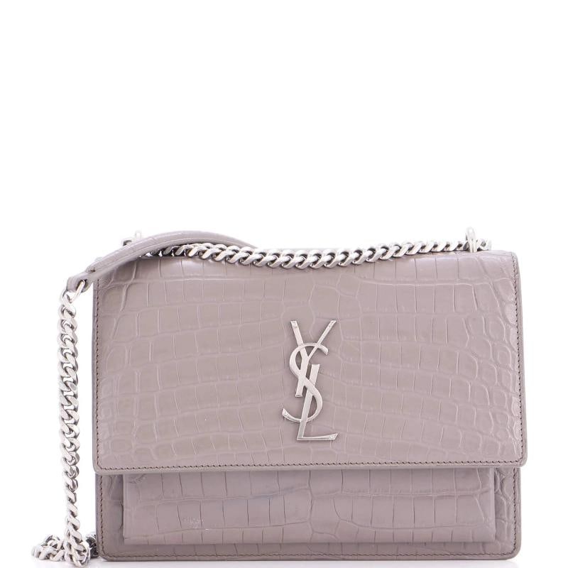 Saint Laurent Sunset Crossbody Bag Crocodile Embossed Leather Medium: Accessories: Clochette Measurements: Handle Drop 11.5", Height 6", Width 8.5", Depth 3", Strap Drop 12-20.5". Condition: Pre-owned - Good,Brand: Saint Laurent,Exterior Material: Leather,Style: Cross