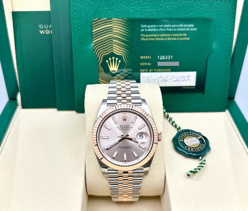 2025 Rolex Datejust 41 126331 Sundust 18K Rose Gold Steel Box Paper Stickers: Style Number: 126331 Year: 2025 Model: Rolex Datejust 41 Case Material: Stainless Steel Band: 18K Rose Gold & Stainless Steel Bezel: 18K Rose Gold Dial: Pink Sundust Crystal: Sapphire Case Size: 41mm 