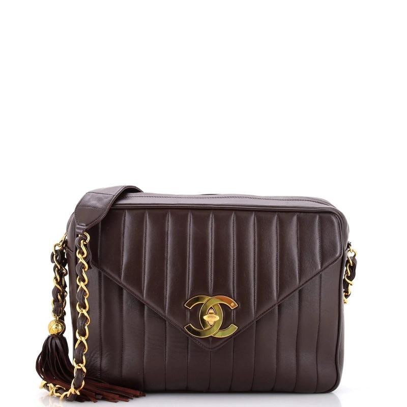 Chanel Vintage Front Pocket Camera Bag Vertical Quilt Lambskin Large: Condition: Pre-owned - Good,Brand: Chanel,Exterior Material: Leather,Style: Shoulder Bags,Exterior Color: Brown,Department: Women,Size: Large