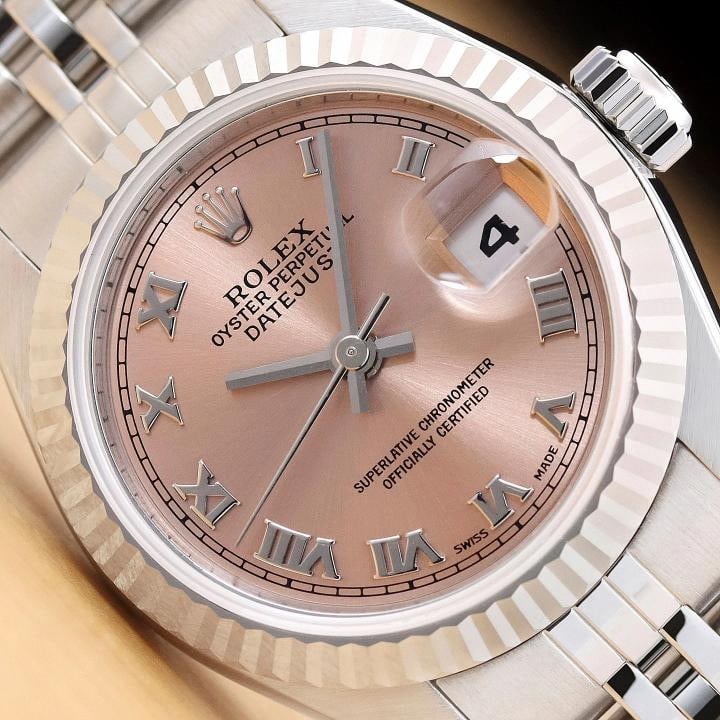 ROLEX LADIES DATEJUST 79174 SALMON ROMAN DIAL 18K GOLD STAINLESS STEEL WATCH: Condition: Pre-owned - Excellent,Bezel Color: Silver,Max Wrist Size: 6.26-6.75 in,Number of Jewels: 31 Jewels,Indices: Roman Numerals, 12-Hour Dial,Band: Rolex Stainless Steel Jubilee Bracelet,Bezel: