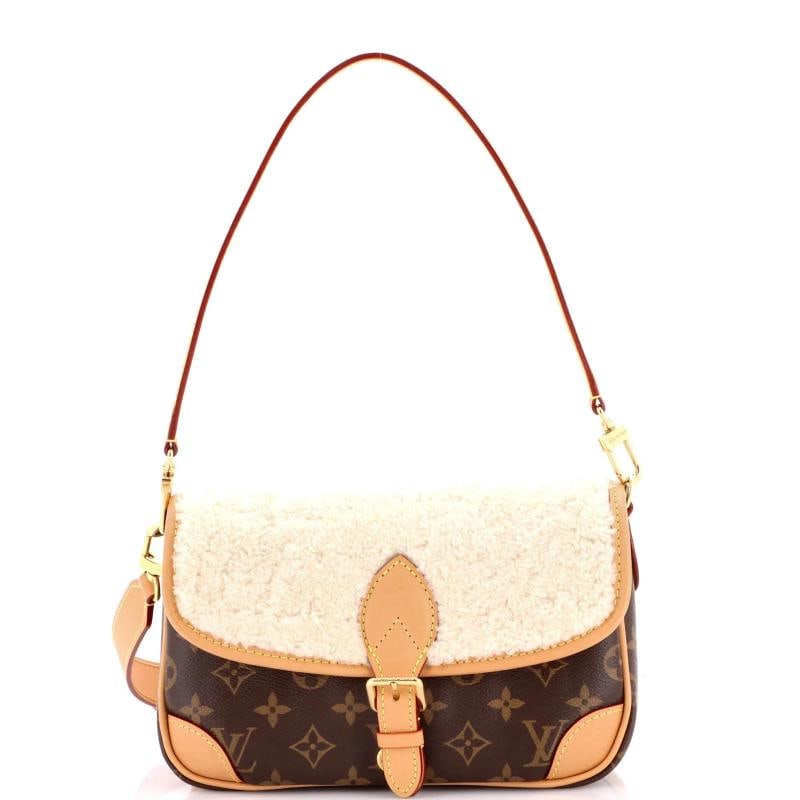 Louis Vuitton Diane NM Handbag Monogram Canvas with Shearling: Accessories: Dust Bag, Extra Strap, With Strap Measurements: Handle Drop 8", Height 6.5", Width 10", Depth 4", Strap Drop 14-17". Condition: Pre-owned - Excellent,Brand: Louis Vuitton,Exterior