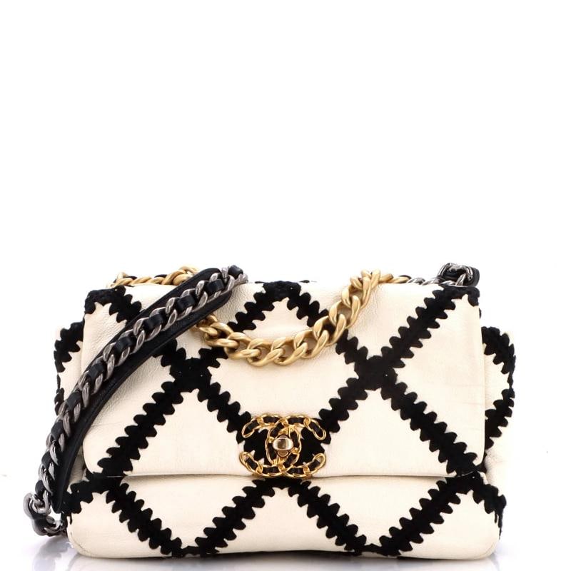 Chanel 19 Flap Bag Crochet Quilted Calfskin Medium: Accessories: Dust Bag, Authenticity Card Measurements: Handle Drop 3", Height 6.5", Width 10", Depth 3", Strap Drop 20". Condition: Pre-owned - Good,Brand: Chanel,Exterior Material: Leather,Style: