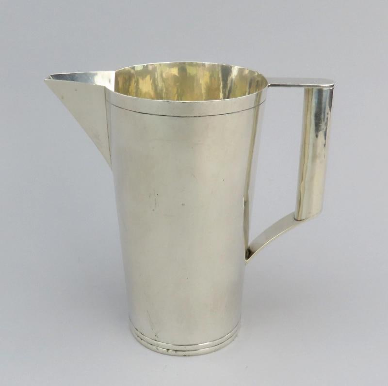 Superb Art Deco/MCM c1920s-1950s German Handwrought 800 Purity Silver Pitcher: Type: Pitcher,Style: Art Deco,Age: 1900-1940,Region: Germany,Composition: Sterling Silver,Country of Origin: Germany Presented is a beautiful vintage or antique German 800 purity silver pitcher,