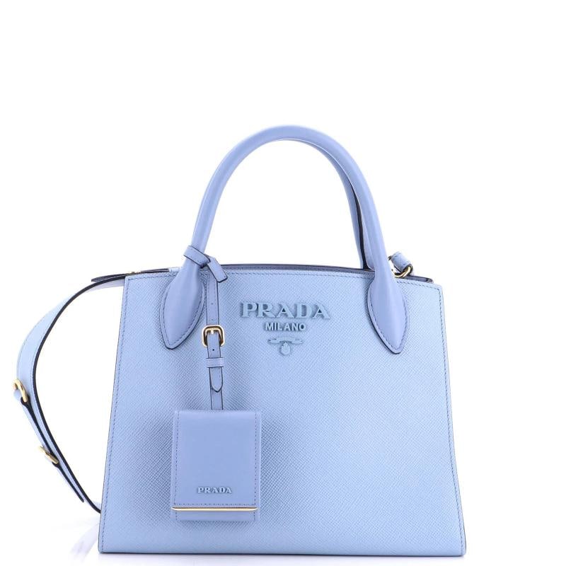 Prada Monochrome Tote Saffiano with City Calf Small: Accessories: Clochette, With Strap Measurements: Handle Drop 4.5", Height 8", Width 10.5", Depth 5", Strap Drop 17" . Condition: Pre-owned - Excellent,Brand: Prada,Exterior Material: Leather,Style: