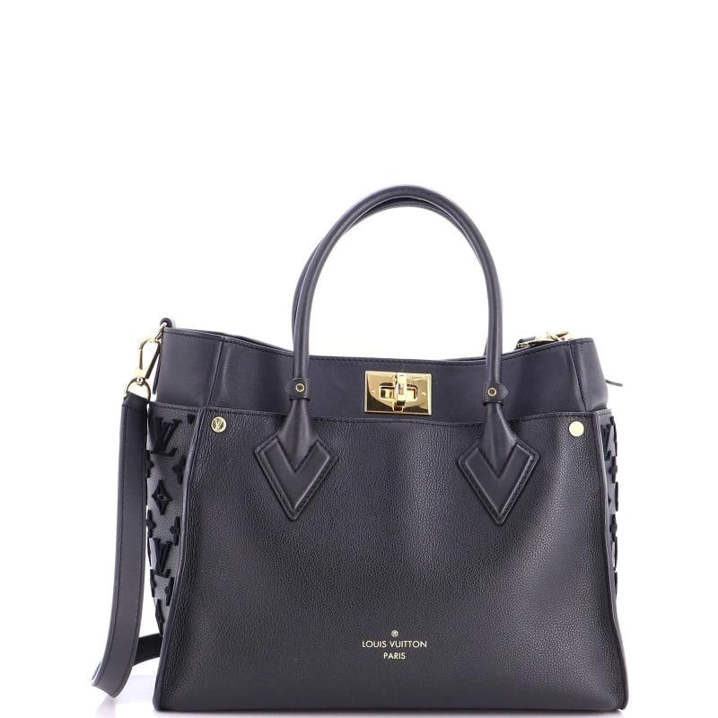 Louis Vuitton On My Side Tote Monogram Tuffetage Leather MM: Accessories: With Strap Measurements: Handle Drop 4", Height 10", Width 12", Depth 5", Strap Drop 20-22". Condition: Pre-owned - Good,Brand: Louis Vuitton,Exterior Material: Leather,Style: