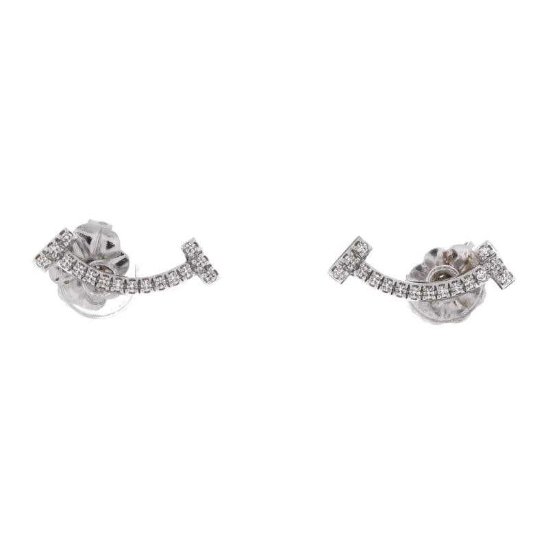 Tiffany & Co. T Smile Stud Earrings 18K White Gold and Diamonds: Measurements: Height/Length: 12.2 mm, Width: 13.35 mm . Condition: Pre-owned - Good,Brand: Tiffany & Co.,Main Stone: Diamond,Metal: 18K White Gold,Metal Purity: 18K,Style: Stud,Type: Earrings,Color:
