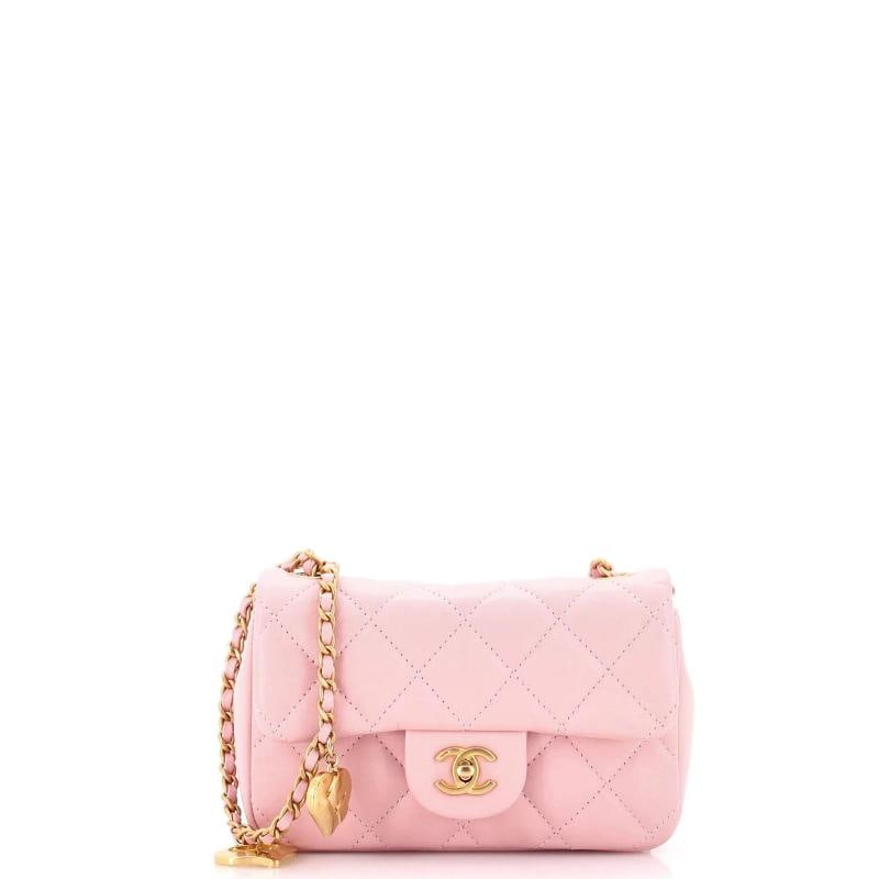 Chanel Heart Charms Flap Bag Quilted Lambskin Mini: Measurements: Height 4.5", Width 7", Depth 2.5" . Condition: Pre-owned - Excellent,Brand: Chanel,Exterior Material: Leather,Style: Cross Body Bags,Exterior Color: Pink,Department: Women,Size: Mini