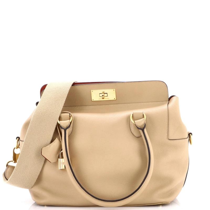 Hermes Toolbox Bag Evercolor 26: Measurements: Length: 14.75 - 16.5 ", Pendant Length: 15.55 mm, Pendant Width: 15.05 mm . Accessories: Clochette, Keys, Lock, With Strap Measurements: Handle Drop 3", Height 10", Width 10.5", Depth