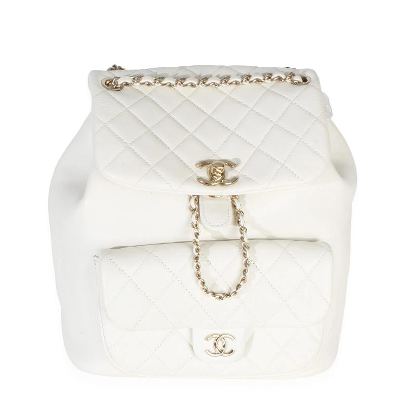 Chanel White Quilted Lambskin Small Duma Drawstring Backpack: Condition: Pre-owned - Good,Dimensions: 8.25 x 8 x 5,Handbag Accessories: None,Bag Width: 8.25 in,Bag Depth: 5 in,Bag Height: 8 in,Department: Unisex,Style: Backpack,Material: Leather,Color: