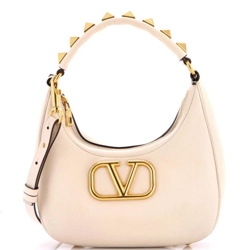 Valentino Garavani Stud Sign Zip Hobo Leather: Accessories: Dust Bag, With Strap Measurements: Handle Drop 8", Height 6", Width 10", Depth 2", Strap Drop 26-28".