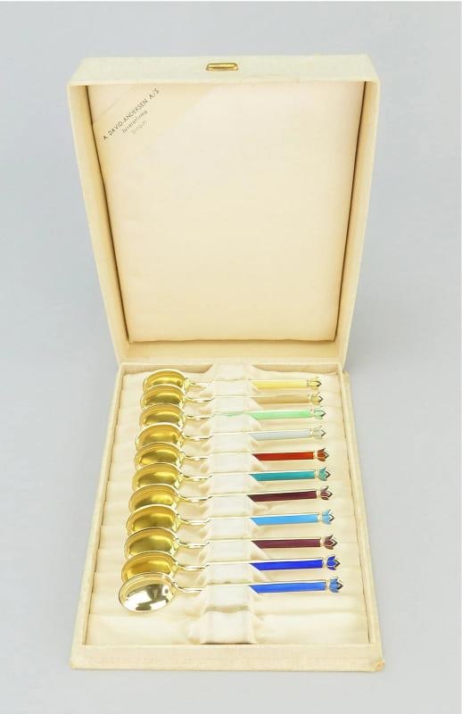11 David Andersen Norway Sterling Silver Gilded Demitasse Spoons Enamel Handles: Length: about 4 inches Box Measurements: 6 1/2 inches long, 5 1/4 inches wide, and 1 1/2 inches tall Weight: 110.5 grams or 3.9 ounces.